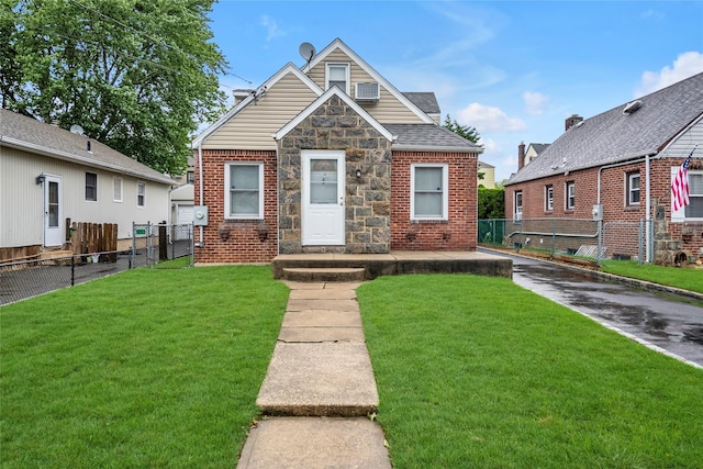 231 Wilson St, West Hempstead, NY 11552 - bungalow-style house featuring brick siding, stone siding, and roof with shingles