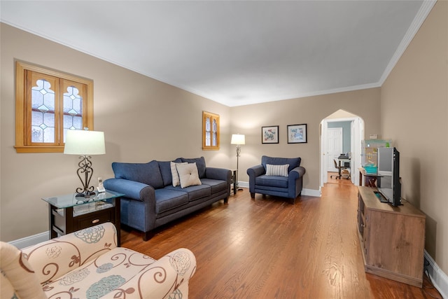 231 Wilson St, West Hempstead, NY 11552 - living room with arched walkways, wood finished floors, and crown molding