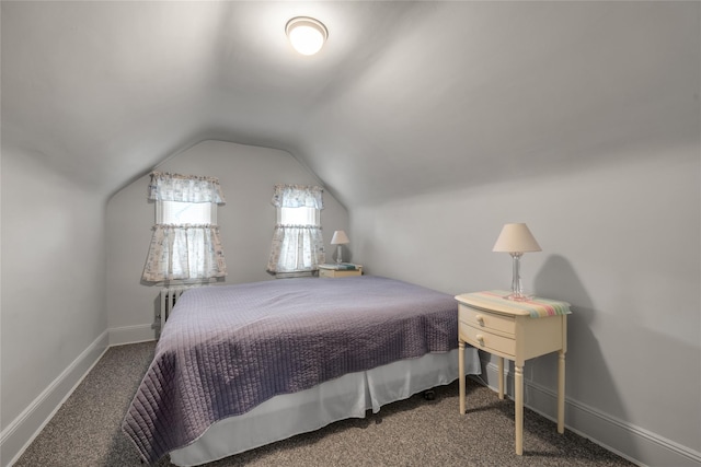 231 Wilson St, West Hempstead, NY 11552 - carpeted bedroom with lofted ceiling and baseboards