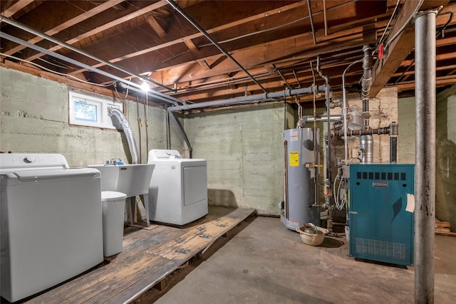 231 Wilson St, West Hempstead, NY 11552 - below grade area with water heater, washer and dryer, and a heating unit