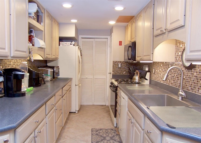 23 Birchwood Rd Unit 23, Coram, NY 11727 - kitchen with white appliances, tasteful backsplash, light tile patterned flooring, open shelves, and recessed lighting