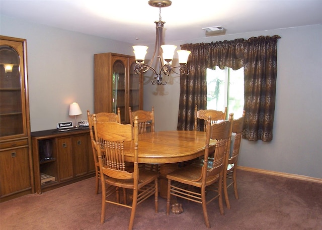 23 Birchwood Rd Unit 23, Coram, NY 11727 - dining area featuring a chandelier and light carpet
