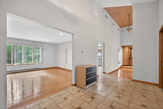 35 Greenlawn Rd, Amawalk, NY 10501 - unfurnished living room with a baseboard heating unit, high vaulted ceiling, wooden ceiling, ceiling fan, and recessed lighting