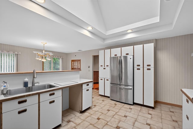 35 Greenlawn Rd, Amawalk, NY 10501 - kitchen with freestanding refrigerator, white cabinets, a chandelier, light countertops, and recessed lighting