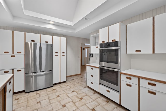 35 Greenlawn Rd, Amawalk, NY 10501 - kitchen with appliances with stainless steel finishes, light countertops, white cabinetry, wallpapered walls, and recessed lighting