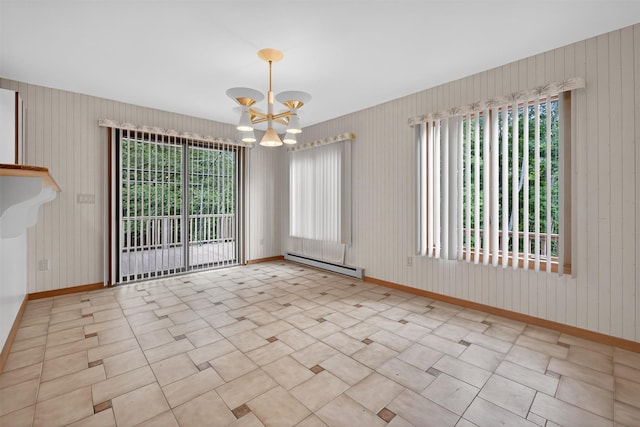 35 Greenlawn Rd, Amawalk, NY 10501 - empty room featuring baseboard heating and a chandelier
