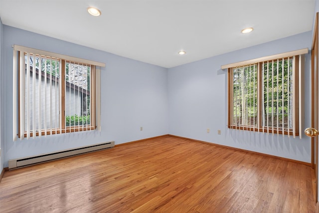 35 Greenlawn Rd, Amawalk, NY 10501 - unfurnished room with baseboard heating, plenty of natural light, wood finished floors, and recessed lighting