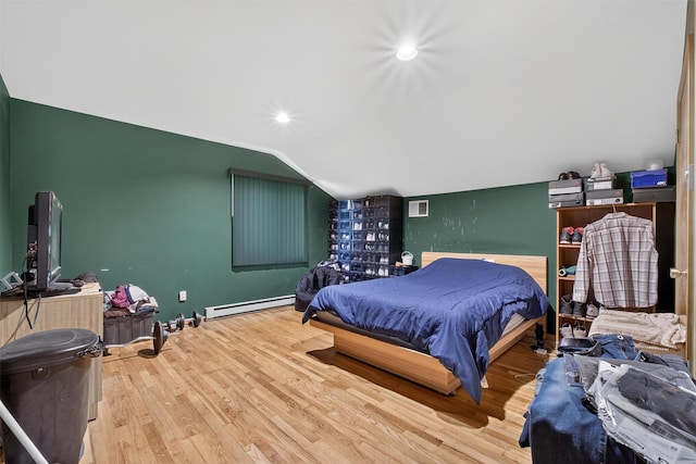 35 Greenlawn Rd, Amawalk, NY 10501 - bedroom featuring vaulted ceiling, baseboard heating, wood finished floors, and recessed lighting
