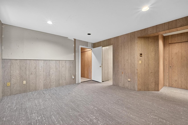 35 Greenlawn Rd, Amawalk, NY 10501 - spare room featuring carpet floors, wood walls, wainscoting, and recessed lighting