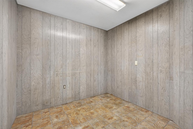 35 Greenlawn Rd, Amawalk, NY 10501 - unfurnished room featuring stone finish flooring and wooden walls