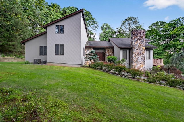 35 Greenlawn Rd, Amawalk, NY 10501 - back of house featuring a lawn and a chimney