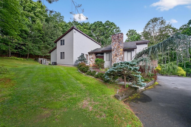 35 Greenlawn Rd, Amawalk, NY 10501 - view of front of property featuring a front lawn and a chimney