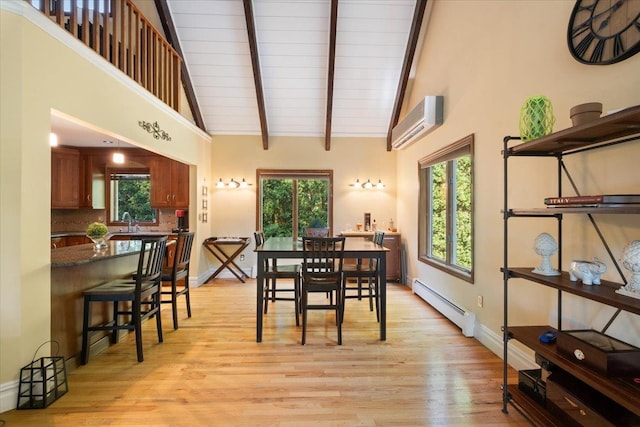 474 Swanson Dr, Thornwood, NY 10594 - dining space featuring a baseboard heating unit, a wall unit AC, wood ceiling, and light wood-style floors
