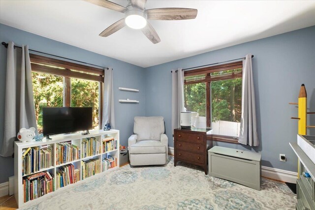 474 Swanson Dr, Thornwood, NY 10594 - living area with healthy amount of natural light and a ceiling fan