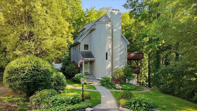 474 Swanson Dr, Thornwood, NY 10594 - view of front of home featuring a chimney and a front yard