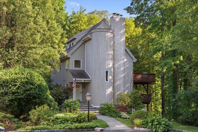 474 Swanson Dr, Thornwood, NY 10594 - view of front facade with a chimney