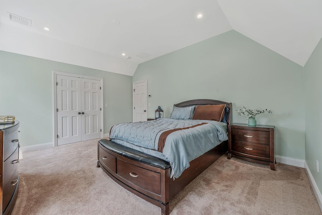 246 Cadman Ave, Babylon, NY 11702 - bedroom with vaulted ceiling, carpet flooring, recessed lighting, and a closet