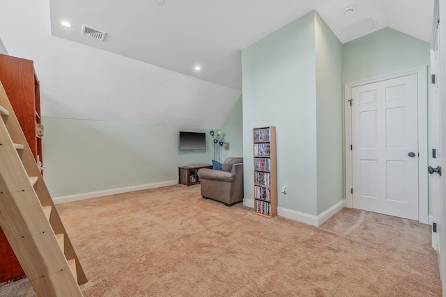 246 Cadman Ave, Babylon, NY 11702 - living area featuring vaulted ceiling, carpet floors, and recessed lighting