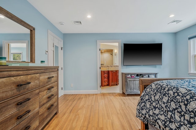 246 Cadman Ave, Babylon, NY 11702 - bedroom featuring light wood finished floors and recessed lighting