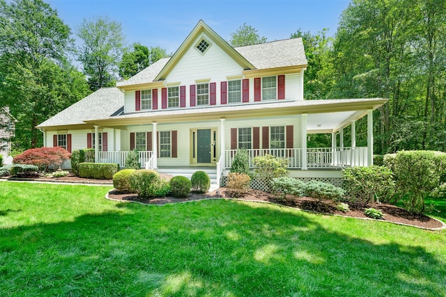 76 Warren St, Somers, NY 10589 - view of front of property with covered porch, a shingled roof, and a front yard