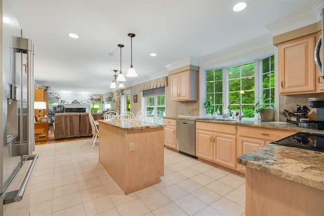 76 Warren St, Somers, NY 10589 - kitchen featuring appliances with stainless steel finishes, light brown cabinetry, open floor plan, ornamental molding, and recessed lighting