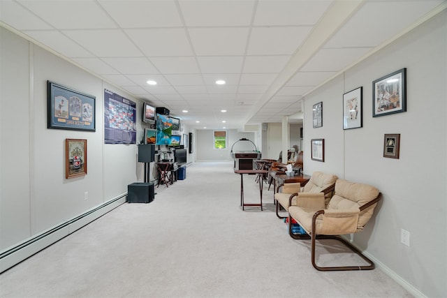 76 Warren St, Somers, NY 10589 - living area featuring a baseboard heating unit, recessed lighting, carpet, and a drop ceiling