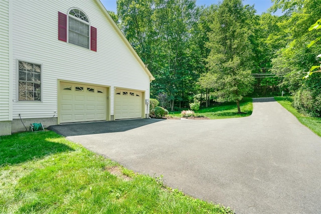 76 Warren St, Somers, NY 10589 - view of side of property featuring driveway, an attached garage, and a yard