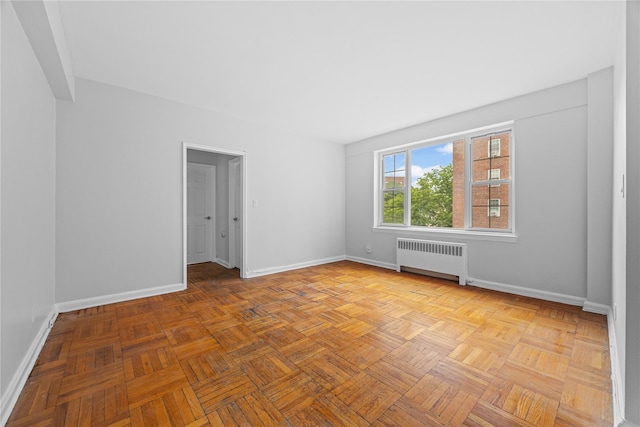 230 Pelham Rd Unit 3O, New Rochelle, NY 10805 - unfurnished room featuring radiator and baseboards
