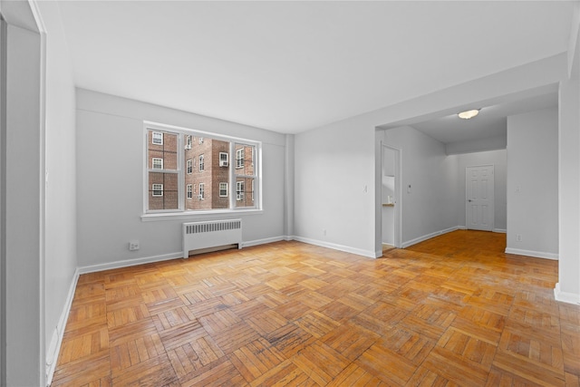 230 Pelham Rd Unit 3O, New Rochelle, NY 10805 - empty room with radiator and baseboards