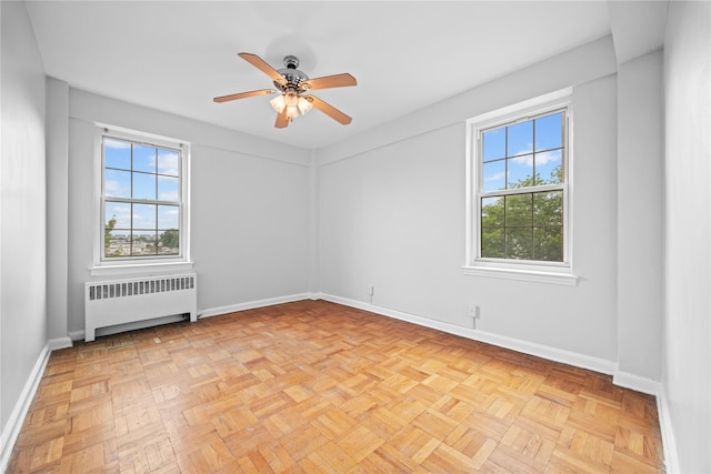 230 Pelham Rd Unit 3O, New Rochelle, NY 10805 - empty room with radiator and a ceiling fan