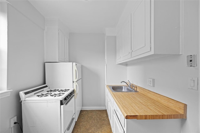 230 Pelham Rd Unit 3O, New Rochelle, NY 10805 - kitchen with white gas stove, white cabinetry, and light countertops
