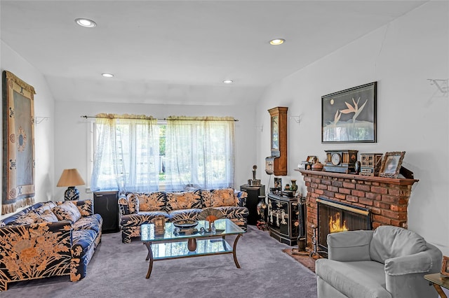 11 Rupert Pl, Melville, NY 11747 - carpeted living area with vaulted ceiling, recessed lighting, and a brick fireplace