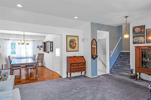 11 Rupert Pl, Melville, NY 11747 - living room featuring a chandelier, stairway, and recessed lighting