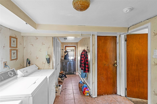 11 Rupert Pl, Melville, NY 11747 - washroom with washing machine and dryer and light tile patterned floors