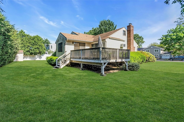 11 Rupert Pl, Melville, NY 11747 - back of house with a deck and a lawn