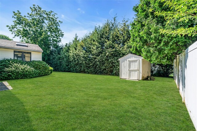 11 Rupert Pl, Melville, NY 11747 - view of green lawn with a storage unit