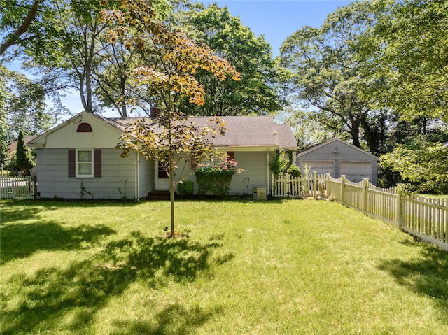 985 Ostrander Ave, Riverhead, NY 11901 - rear view of house featuring a garage, a chimney, and an outdoor structure
