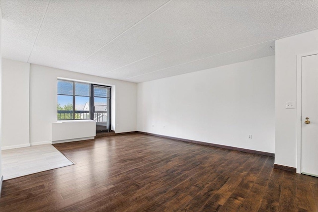 50 Columbus Ave Unit 611, Tuckahoe, NY 10707 - empty room with wood finished floors and a textured ceiling