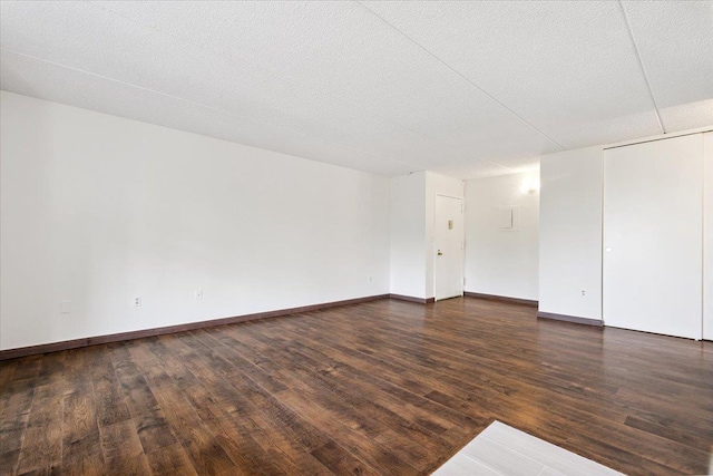 50 Columbus Ave Unit 611, Tuckahoe, NY 10707 - unfurnished room featuring dark wood-style flooring and a textured ceiling