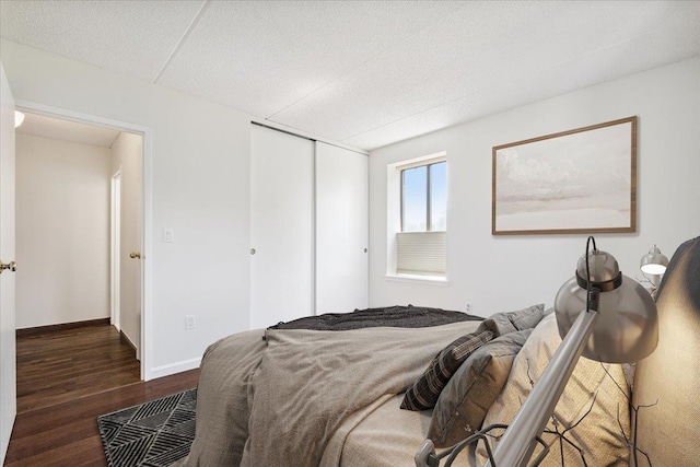 50 Columbus Ave Unit 611, Tuckahoe, NY 10707 - bedroom with dark wood-type flooring and a closet