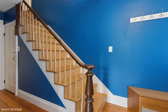 4 Dewindt St, Beacon, NY 12508 - staircase with wood finished floors and baseboards