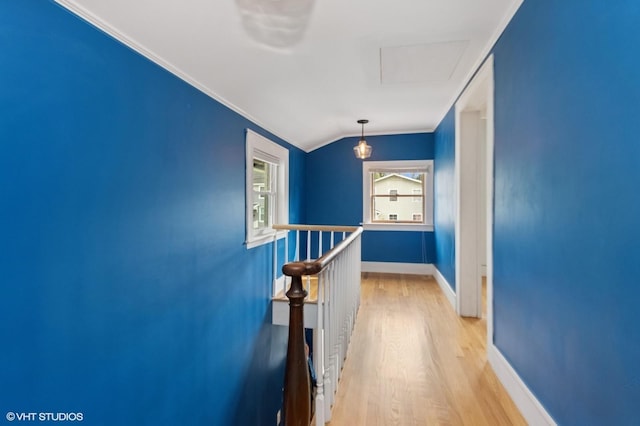 4 Dewindt St, Beacon, NY 12508 - hall with ornamental molding, wood finished floors, and an upstairs landing