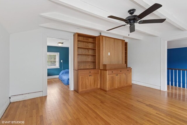 4 Dewindt St, Beacon, NY 12508 - unfurnished living room featuring beamed ceiling, light wood-style flooring, and ceiling fan