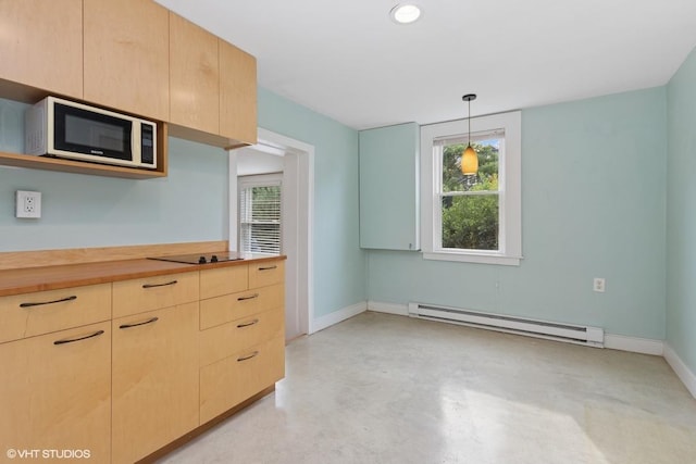 4 Dewindt St, Beacon, NY 12508 - kitchen with white microwave, a baseboard radiator, light brown cabinetry, finished concrete flooring, and decorative light fixtures