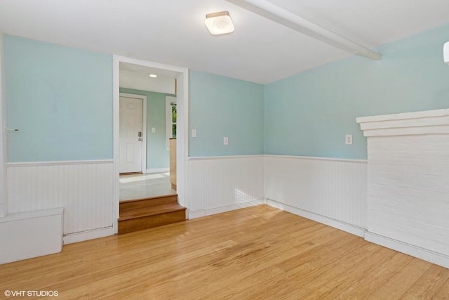 4 Dewindt St, Beacon, NY 12508 - spare room with wainscoting and wood finished floors