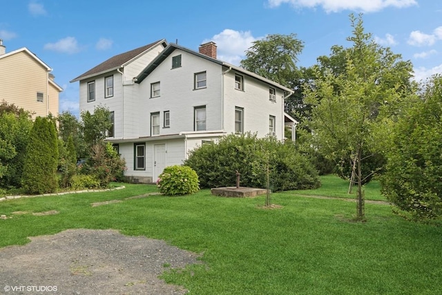 4 Dewindt St, Beacon, NY 12508 - back of house with a lawn and a chimney