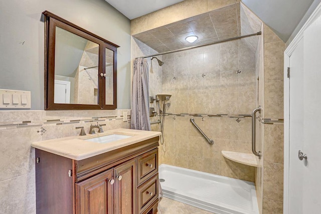 313 Pine St, Freeport, NY 11520 - bathroom featuring a shower stall, vanity, and tile walls