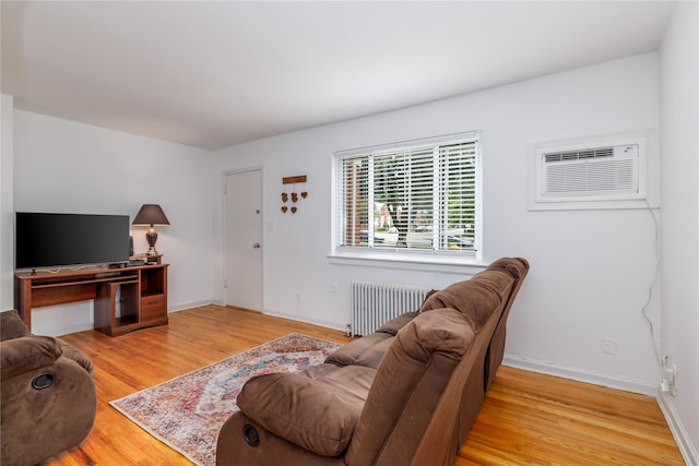 71-12 260th St Fl H 1St, Glen Oaks, NY 11004 - living room with radiator and wood finished floors
