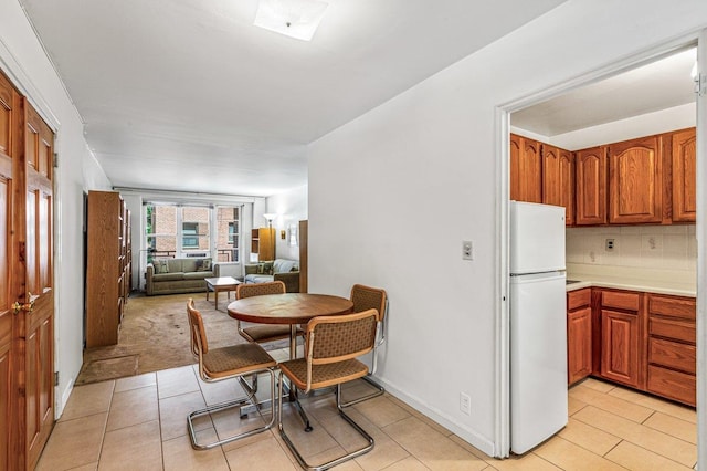 35-51 85th St Unit 2F, Jackson Heights, NY 11372 - dining room featuring light tile patterned floors and baseboards