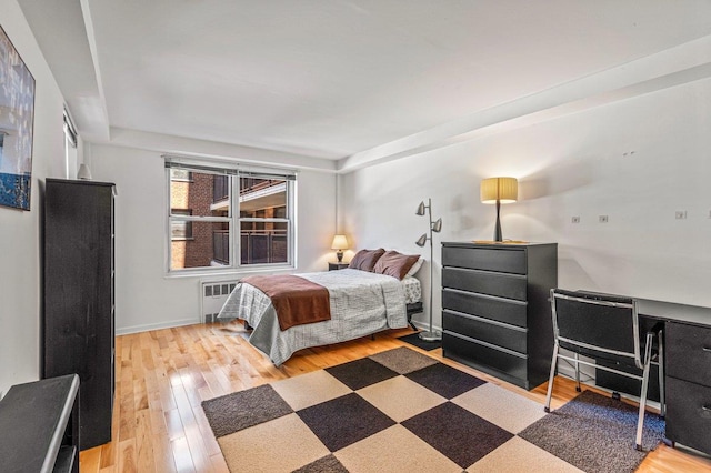 35-51 85th St Unit 2F, Jackson Heights, NY 11372 - bedroom featuring light wood-type flooring and radiator